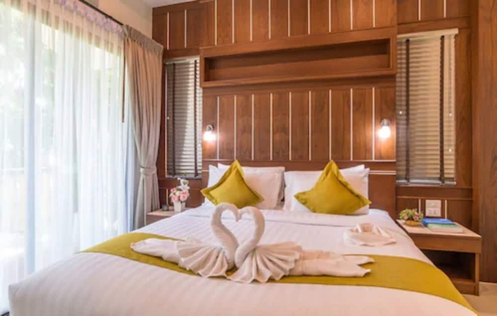 Imagen de la habitación del Hotel The Scene Cliff View Villas. Foto 5