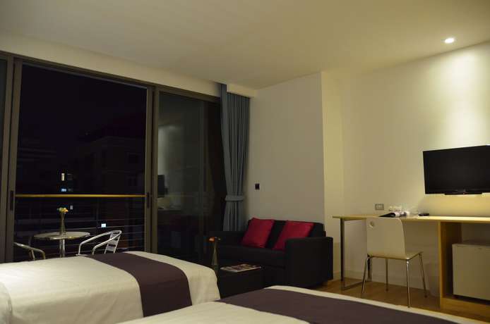Imagen de la habitación del Hotel The Scenery City. Foto 7