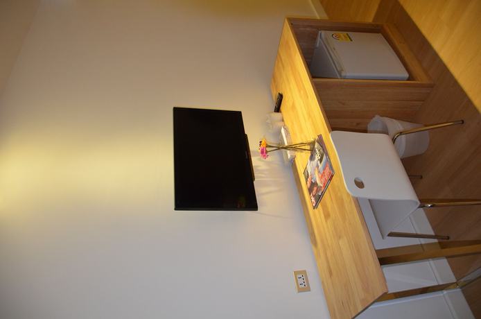 Imagen de la habitación del Hotel The Scenery City. Foto 9