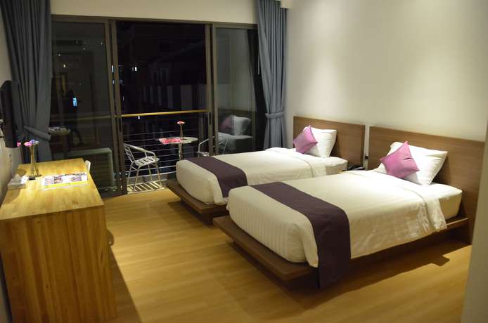 Imagen de la habitación del Hotel The Scenery City. Foto 17
