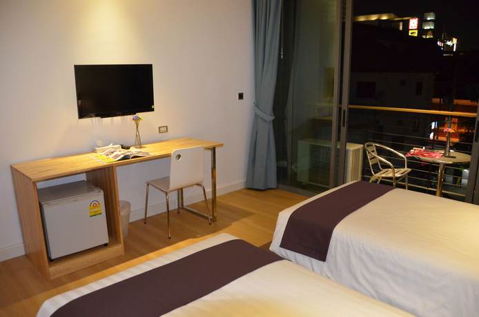 Imagen de la habitación del Hotel The Scenery City. Foto 18
