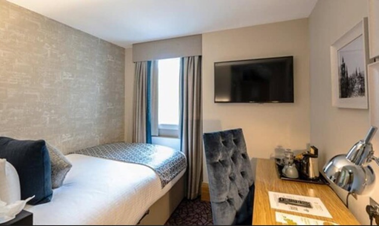 Imagen de la habitación del Hotel The Scholar. Foto 8