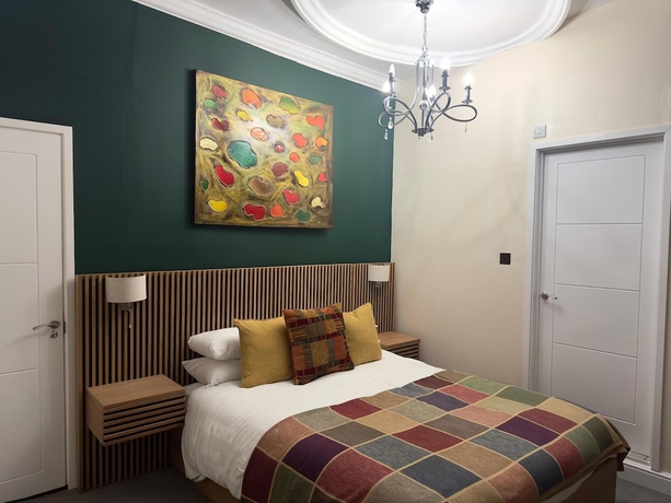 Imagen de la habitación del Hotel The Scole. Foto 5