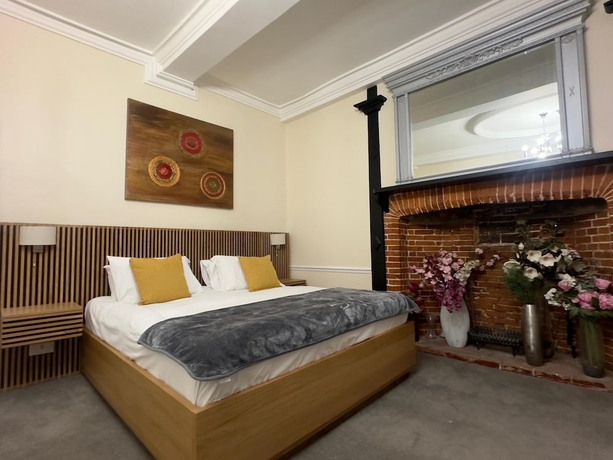 Imagen de la habitación del Hotel The Scole. Foto 8