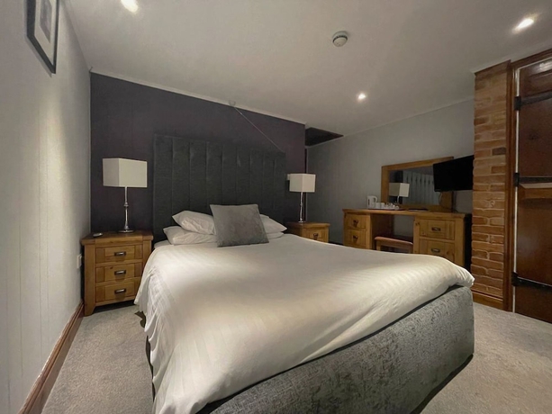 Imagen de la habitación del Hotel The Scole. Foto 9