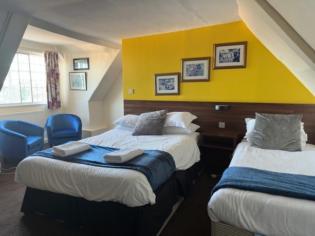 Imagen de la habitación del Hotel The Scole. Foto 16