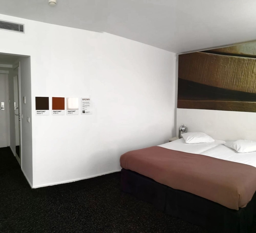 Imagen de la habitación del Hotel The Scott Brussels. Foto 9