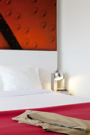 Imagen de la habitación del Hotel The Scott Brussels. Foto 10