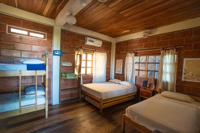 Imagen de la habitación del Hotel The Sea Garden House. Foto 3