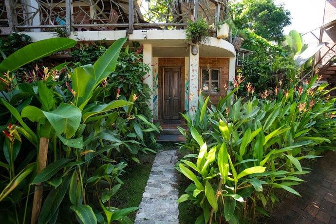 Imagen de la habitación del Hotel The Sea Garden House. Foto 6