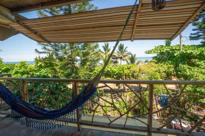 Imagen de la habitación del Hotel The Sea Garden House. Foto 11