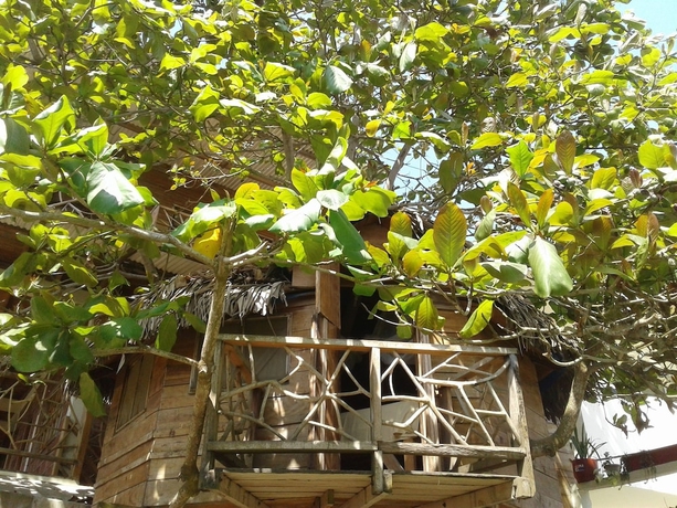 Imagen de la habitación del Hotel The Sea Garden House. Foto 12