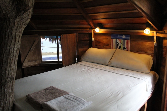 Imagen de la habitación del Hotel The Sea Garden House. Foto 13