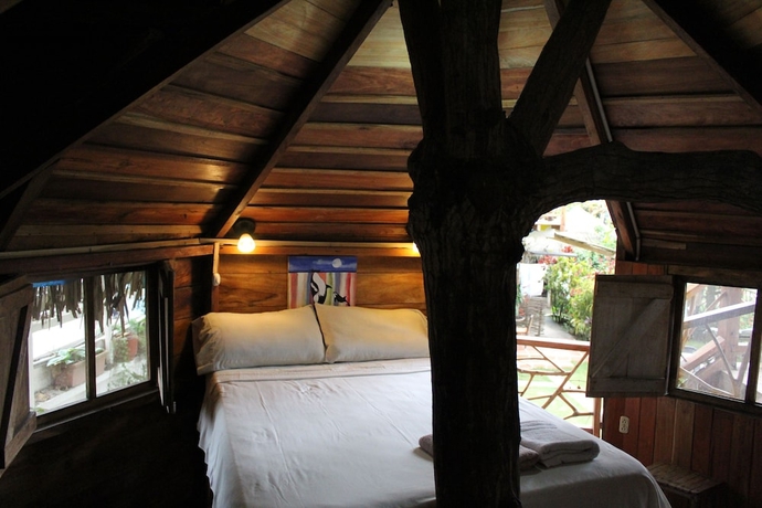 Imagen de la habitación del Hotel The Sea Garden House. Foto 14