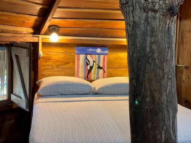 Imagen de la habitación del Hotel The Sea Garden House. Foto 16