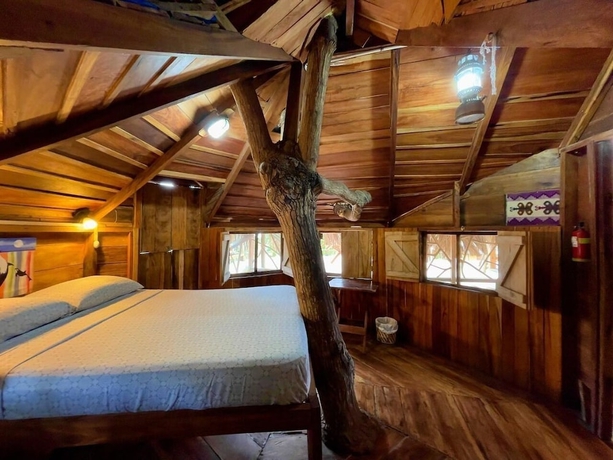 Imagen de la habitación del Hotel The Sea Garden House. Foto 18