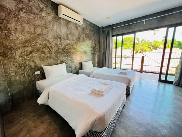 Imagen de la habitación del Hotel The Sea Resort Haad Rin. Foto 16