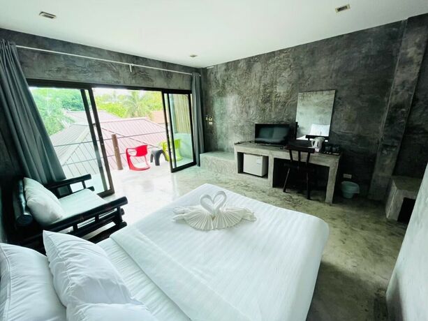 Imagen de la habitación del Hotel The Sea Resort Haad Rin. Foto 17