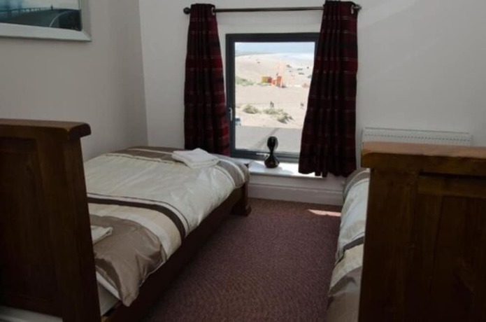 Imagen de la habitación del Hotel The SeaFront at Inch Beach. Foto 14