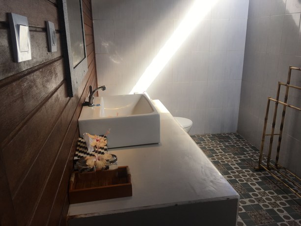 Imagen de la habitación del Hotel The Seaman Garden Huts. Foto 6
