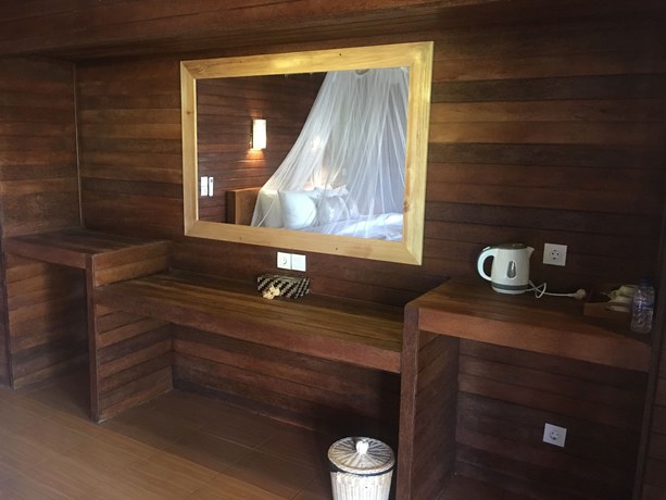 Imagen de la habitación del Hotel The Seaman Garden Huts. Foto 7