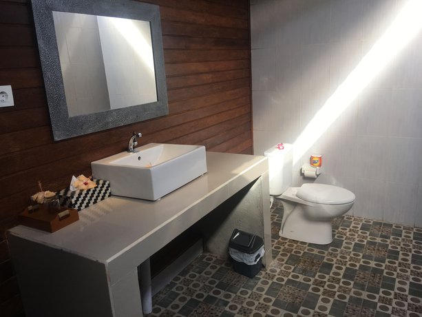 Imagen de la habitación del Hotel The Seaman Garden Huts. Foto 11
