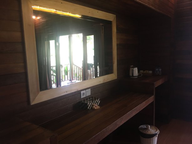 Imagen de la habitación del Hotel The Seaman Garden Huts. Foto 12