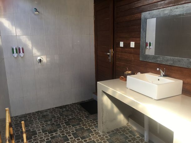 Imagen de la habitación del Hotel The Seaman Garden Huts. Foto 13