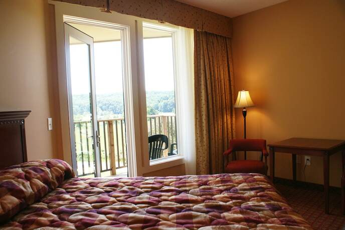 Imagen de la habitación del Hotel The Seasons Lodge. Foto 20
