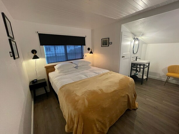 Imagen de la habitación del Hotel The Seaview Cottages. Foto 13
