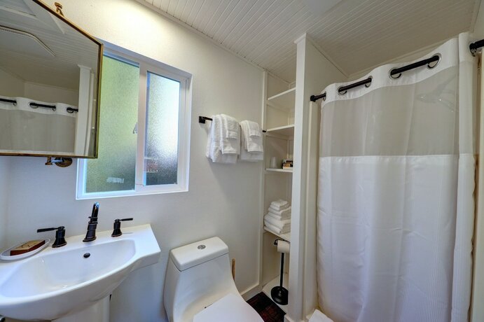Imagen de la habitación del Hotel The Seaview Cottages. Foto 18