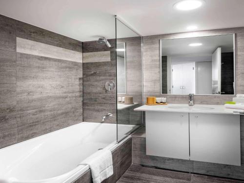 Imagen de la habitación del Hotel The Sebel Brisbane. Foto 20