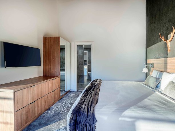 Imagen de la habitación del Hotel The Sebel Pinnacle Valley Resort. Foto 13