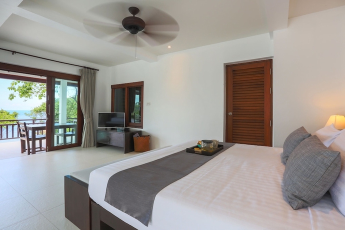 Imagen de la habitación del Hotel The Secret Beach Villa. Foto 11