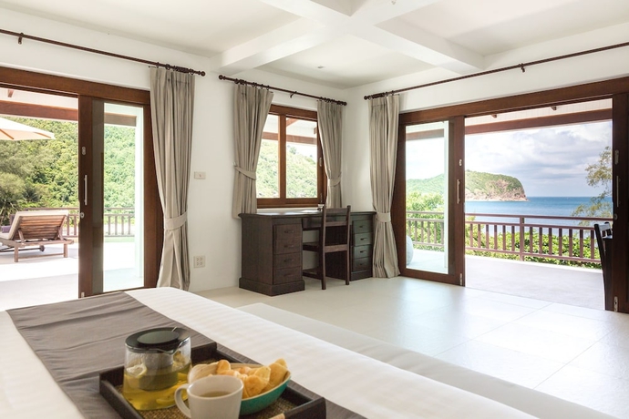 Imagen de la habitación del Hotel The Secret Beach Villa. Foto 12
