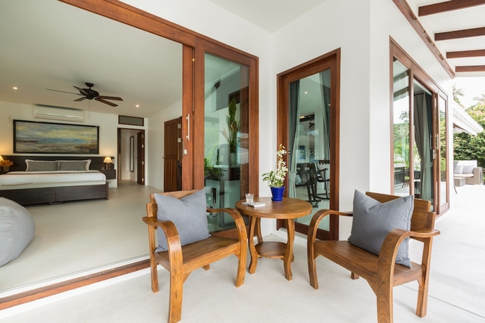 Imagen de la habitación del Hotel The Secret Beach Villa. Foto 16