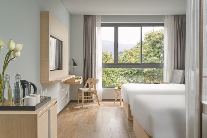 Imagen de la habitación del Hotel The Secret Con Dao. Foto 12