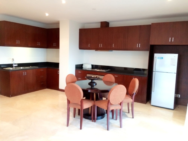 Imagen de la habitación del Hotel The Segara Suites. Foto 11