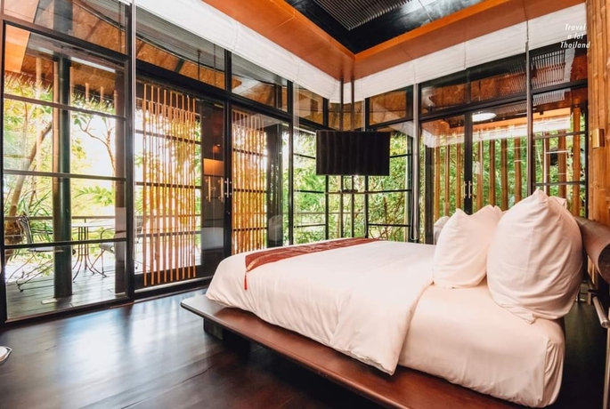 Imagen de la habitación del Hotel The Sense Resort Kanchanaburi. Foto 2