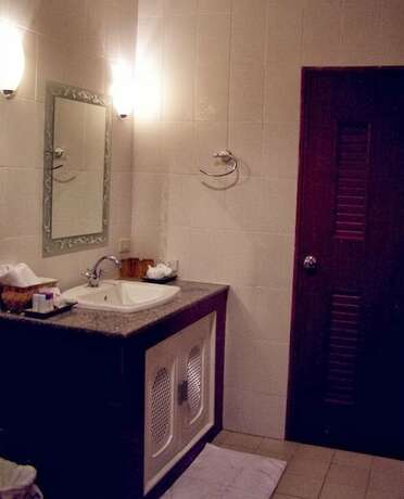 Imagen de la habitación del Hotel The Senses Resort. Foto 10