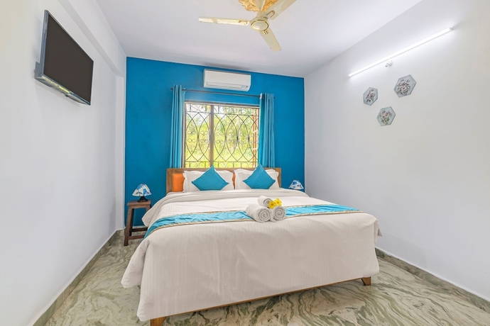Imagen de la habitación del Hotel The Sequeira Guest House. Foto 11