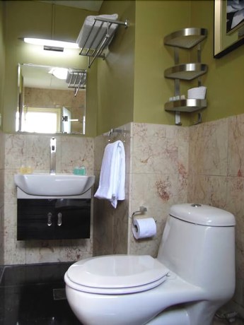 Imagen de la habitación del Hotel The Serangoon House, Singapore, A Tribute Portfolio. Foto 5