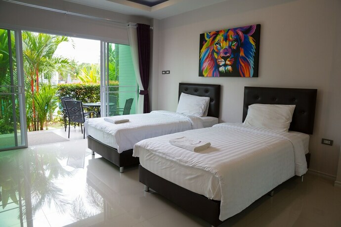 Imagen de la habitación del Hotel The Serenity Resort, SATTAHIP. Foto 28