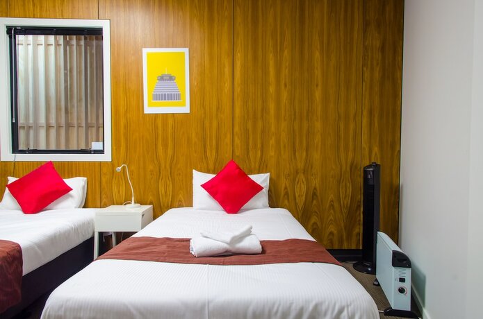 Imagen de la habitación del Hotel The Setup On Manners Serviced Apartments. Foto 7