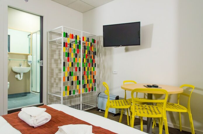 Imagen de la habitación del Hotel The Setup On Manners Serviced Apartments. Foto 17