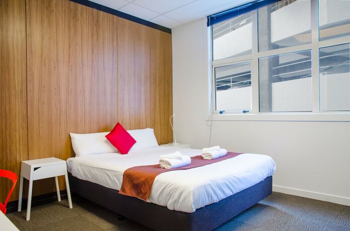 Imagen de la habitación del Hotel The Setup On Manners Serviced Apartments. Foto 19