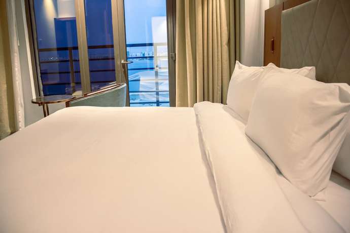 Imagen de la habitación del Hotel The Seven, Manama. Foto 7