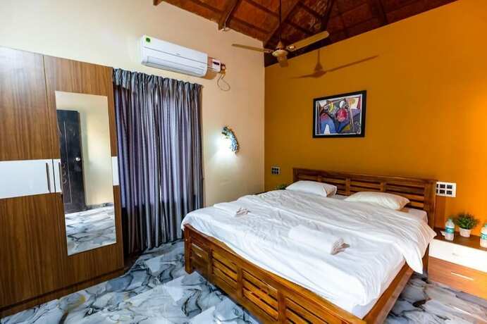 Imagen de la habitación del Hotel The Seventh Heaven Resort And Ocean Stays. Foto 17