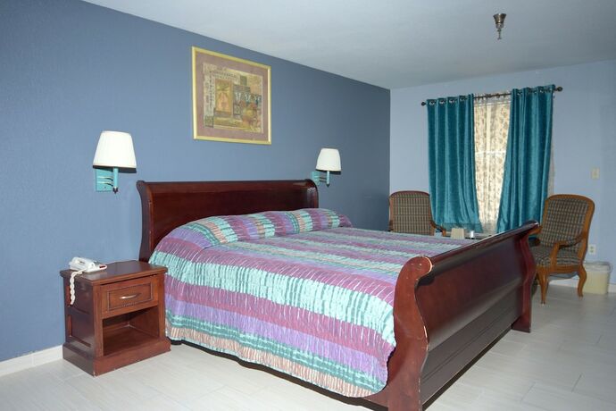 Imagen de la habitación del Hotel The Shades Motel. Foto 11