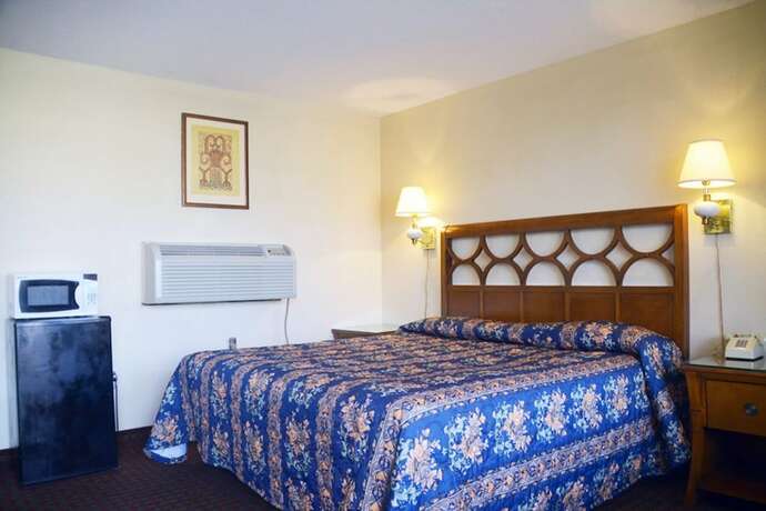 Imagen de la habitación del Hotel The Shades Motel. Foto 13